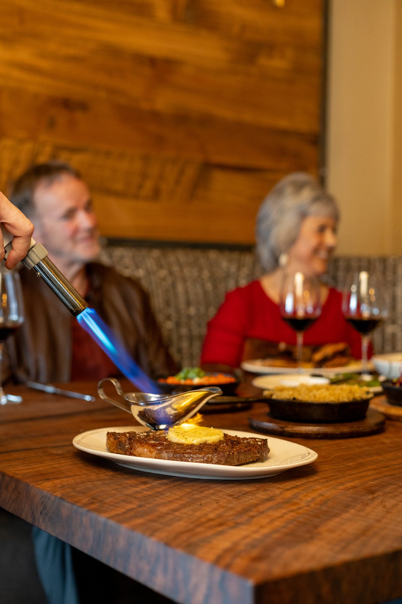 A steak finished with a torch
